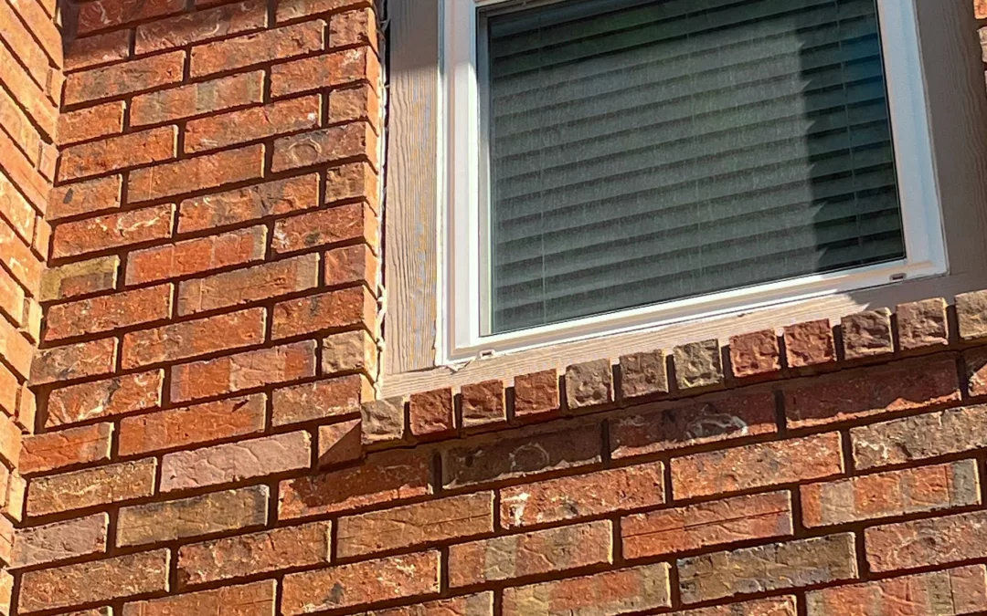One of the most common Pier and Beam Foundation Problems showing. Window and brick wall cracks.